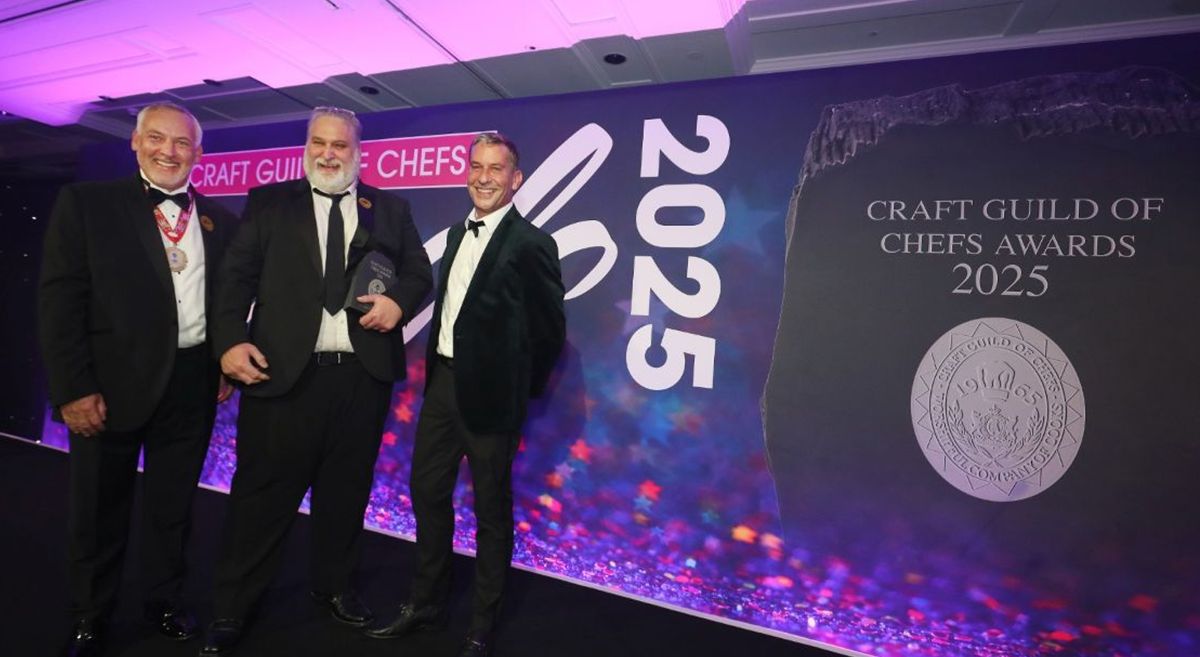 Picture of Brian Magill at an awards ceremony